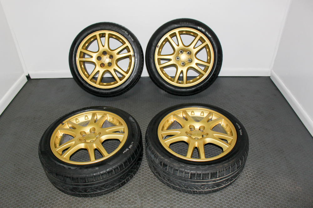 JDM 10-Spoke Gold Enkei Wheels – WRX STI Version 7 17x7.5 +48 5x100 for Sale