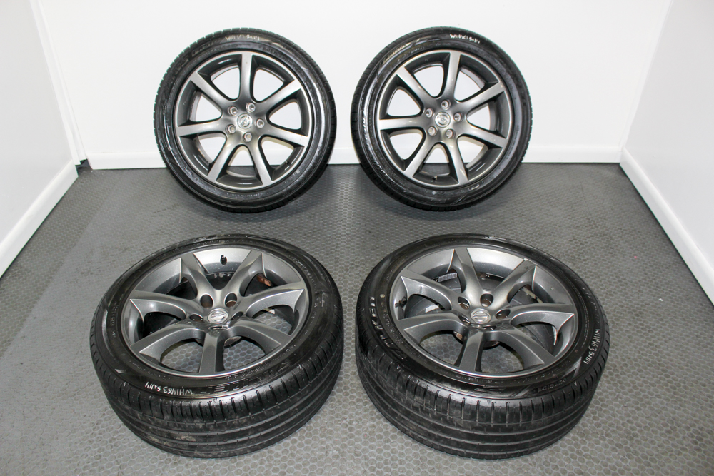 OEM Infiniti G35 7-Spoke 18x8 +30 Wheels with Used Tires