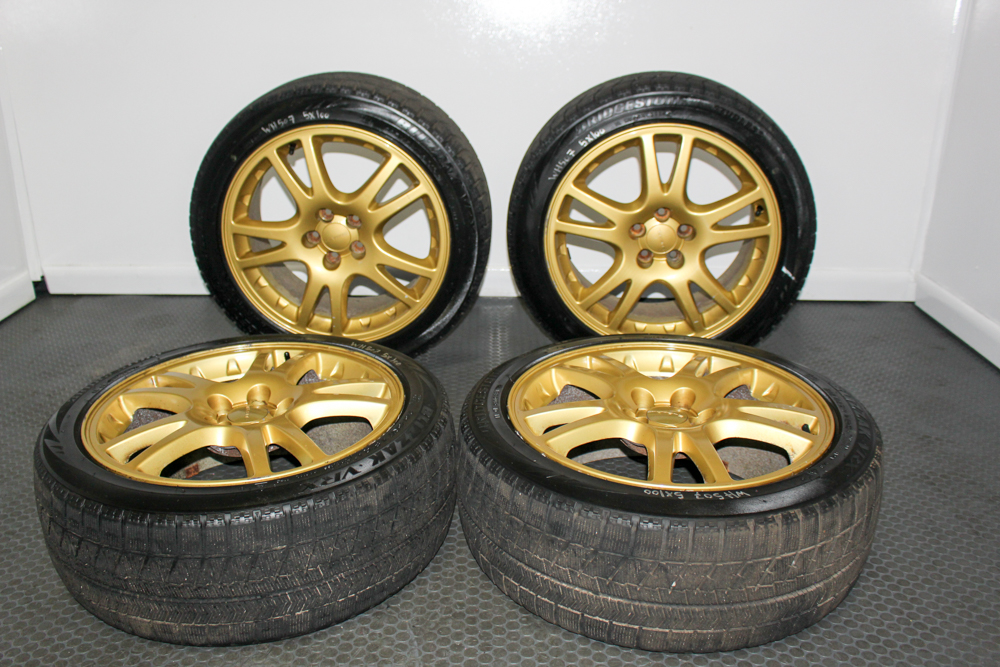 Subaru WRX STI V7 gold Enkei wheels JDM STI Version 7 17 inch gold wheels Subaru STI Enkei wheels Brembo clearance OEM Subaru WRX STI gold wheels set