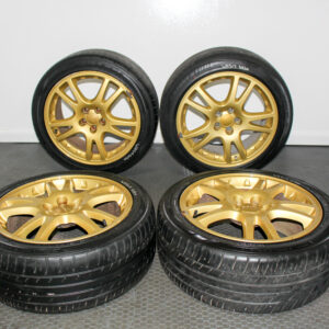Subaru WRX STI Version 7 gold wheels OEM STI V7 17x7.5 gold rims Subaru STI wheels Brembo brake clearance JDM Subaru STI 10 spoke gold wheels Subaru WRX STI OEM gold wheel set