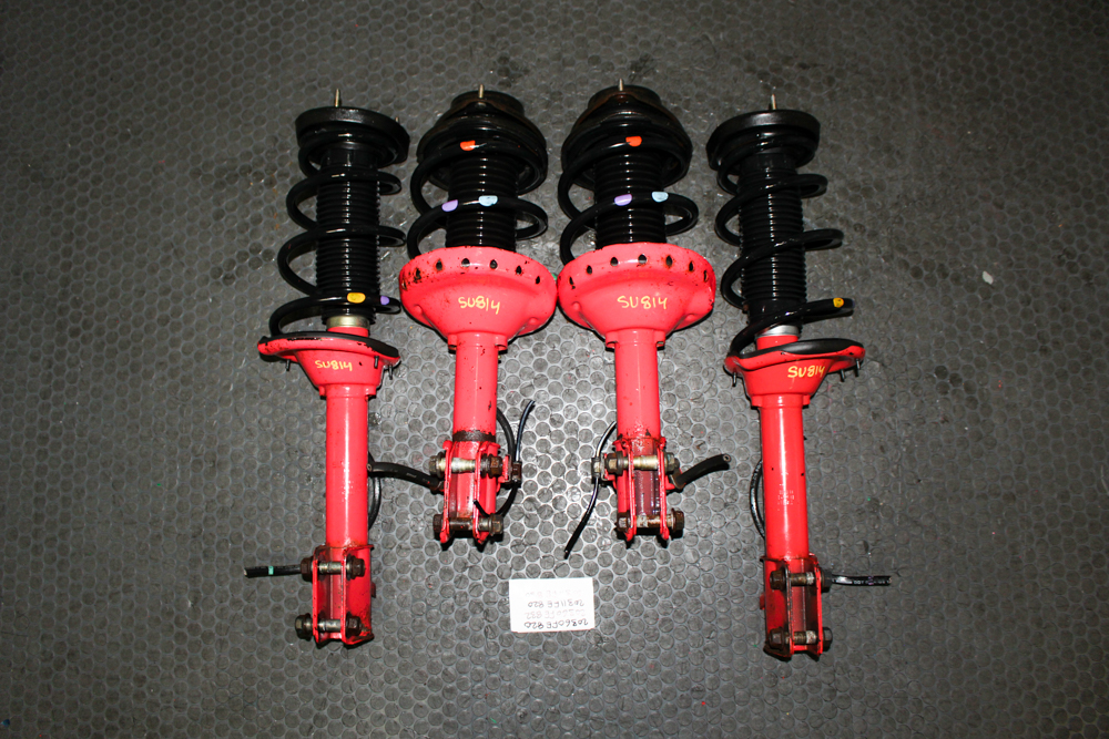 Buy JDM Subaru WRX STI GDB pink struts and springs 2002–2007 5x100. OEM STI suspension upgrade available at J-Spec Auto Sports Inc.