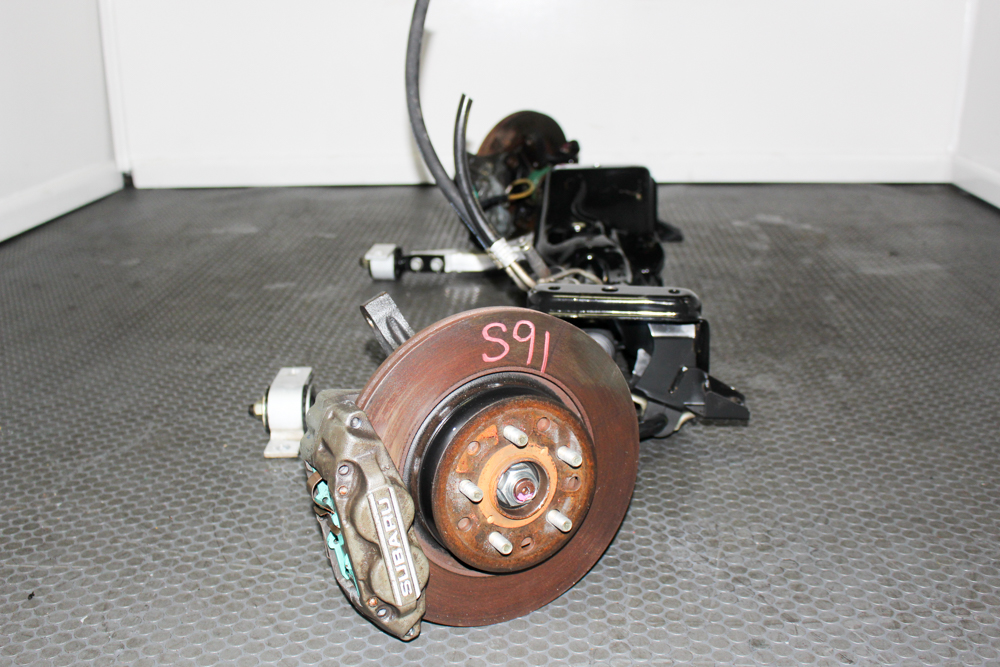 2002-2007 Subaru WRX Front Subframe Assembly, Subaru WRX 4 Pot Brake Calipers, STI Aluminum Lower Control Arms, JDM Subaru Front Crossmember, Subaru WRX Suspension Upgrade Parts, GD Subaru WRX Front Suspension Assembly, Subaru Performance Front End Components, Subaru Drift Build Suspension Parts, J-Spec Auto Sports Subaru WRX Parts, Subaru Front Subframe With STI Control Arms
