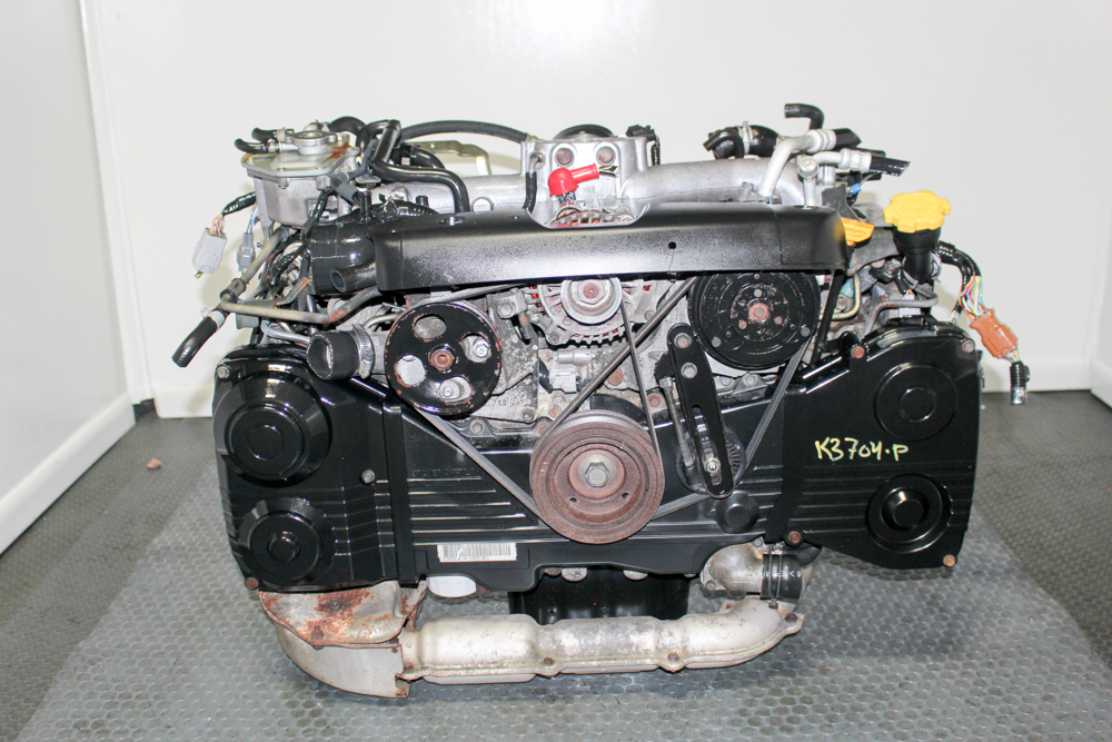 Low-mileage JDM Subaru EJ205 2.0L turbo replacement engine for the 2002–2005 Subaru WRX, compression tested and professionally inspected by J-Spec Auto Sports.