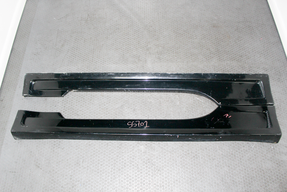 Used aftermarket JDM-style fiberglass rocker panels in black for 2003–2009 Nissan 350Z Z33, left and right pair