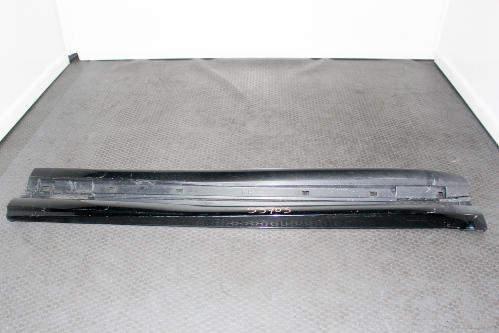 Pair of black OEM rocker panels for 2005–2007 Subaru WRX STI GDB, driver and passenger side