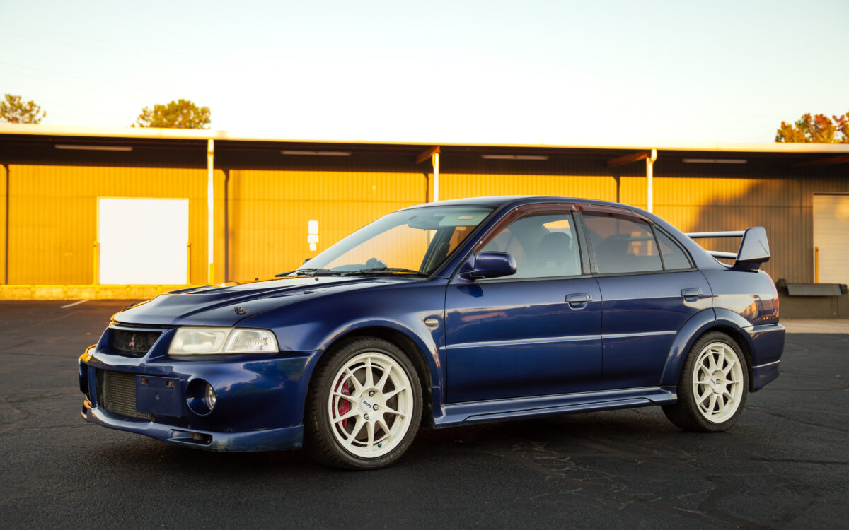 JDM Mitsubishi Lancer Evo VI GSR CP9A with genuine 2-piece rear spoiler and Enkei 17-inch wheels, right-hand drive